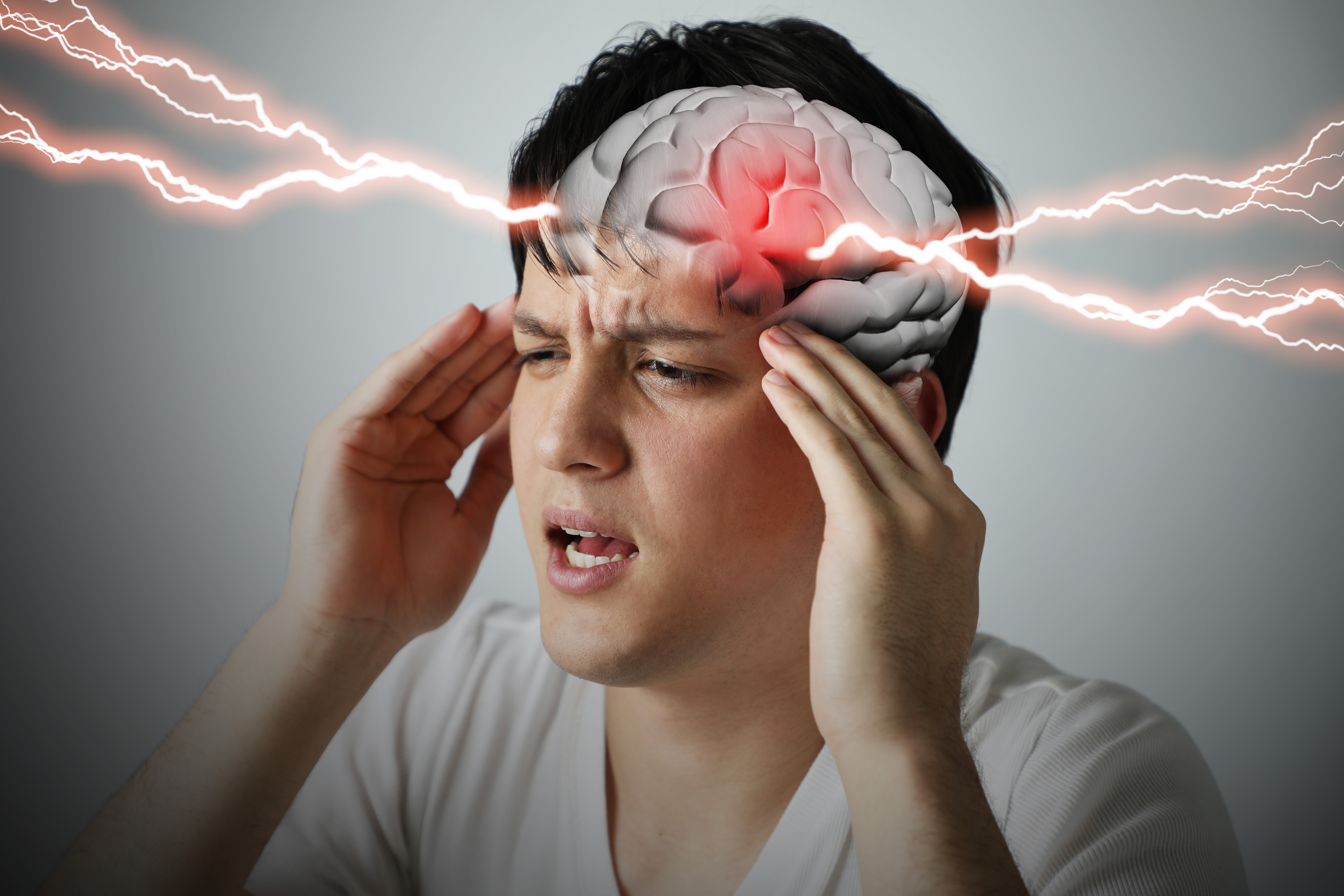 Concussion_Migraine_Headache_Male_Pain_Brain_Head.jpg